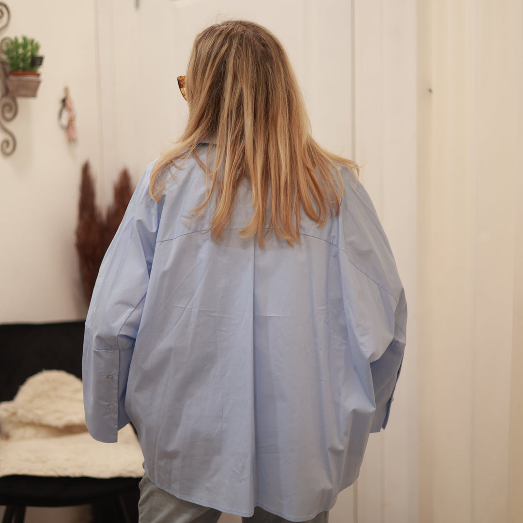 Bluse mit ausgestelltem Arm
