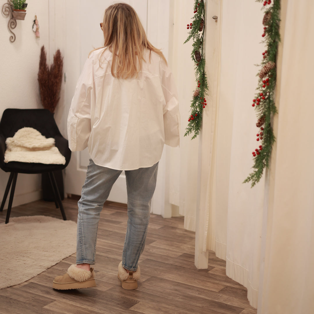 Bluse mit ausgestelltem Arm