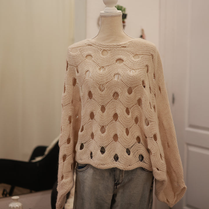 Strickpulli mit Lochmuster