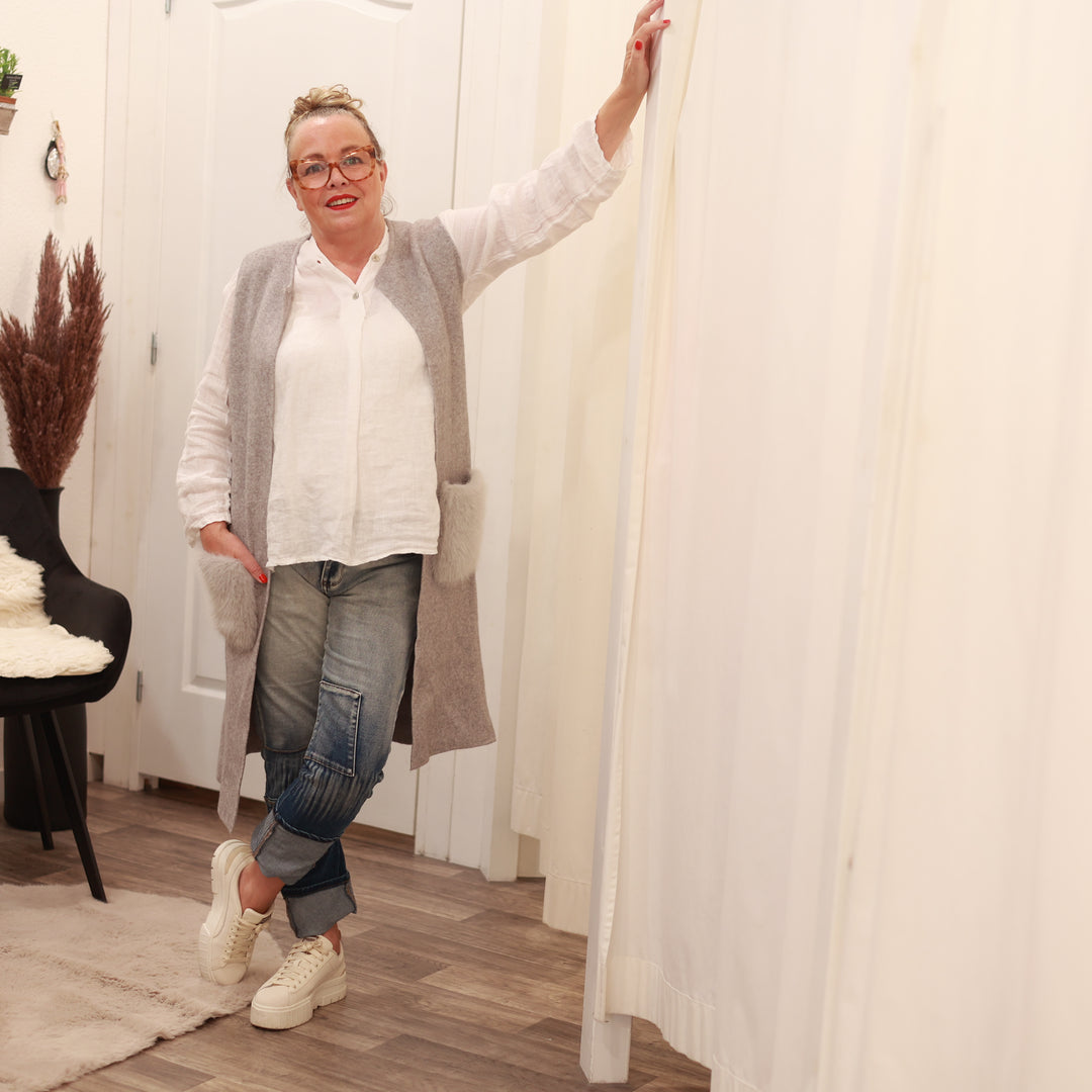 Strickweste mit Kunstfelltasche